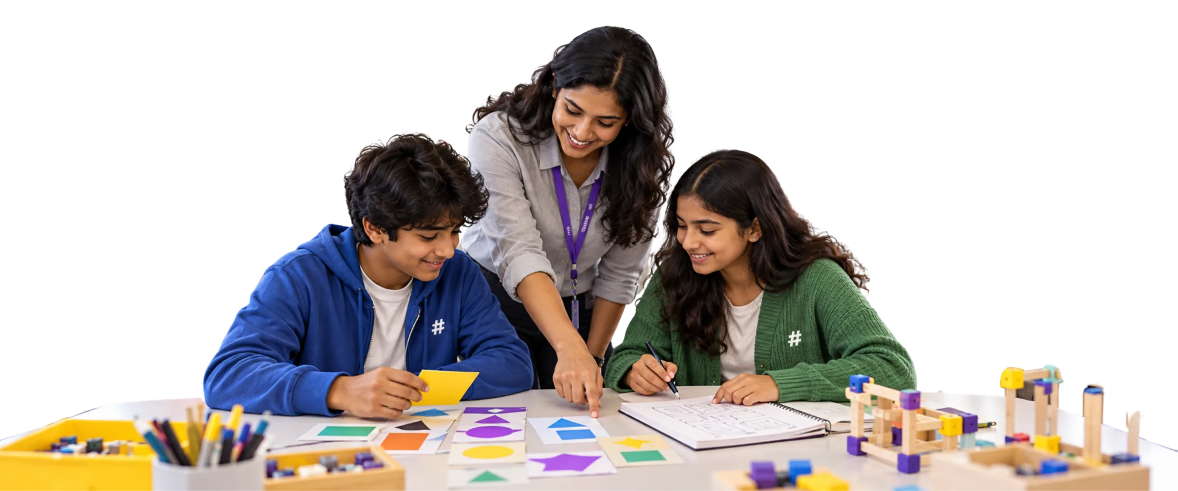 Mentor guiding two learners through hands-on materials at a table